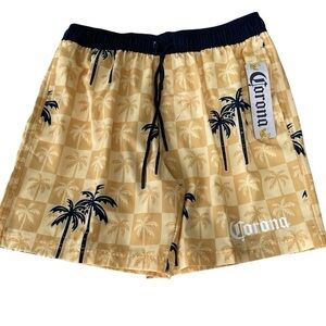 Man Corona Athletic Yellow and Black Shorts with Tropical Design for swim.